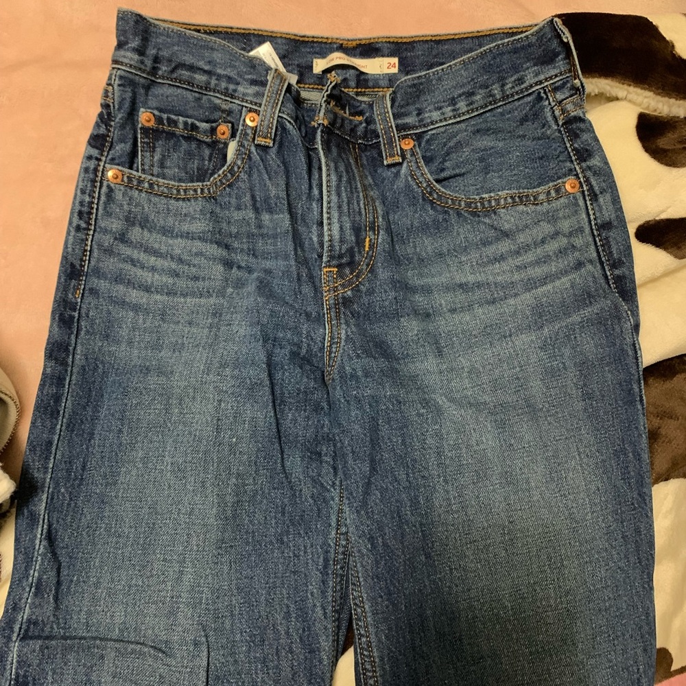 Levi’s Low Pro Jeans in a Medium/Dark wash